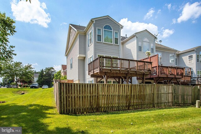 8859 Howland Pl, Bristow, VA 20136 - rear view of house featuring a wooden deck