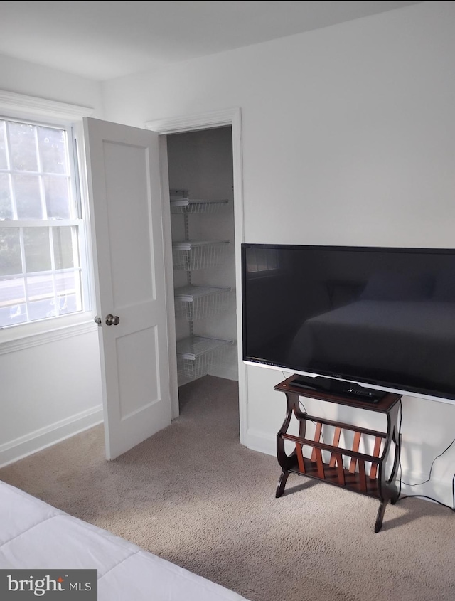 5709 Walther Ave, Baltimore, MD 21206 - carpeted bedroom featuring a walk in closet
