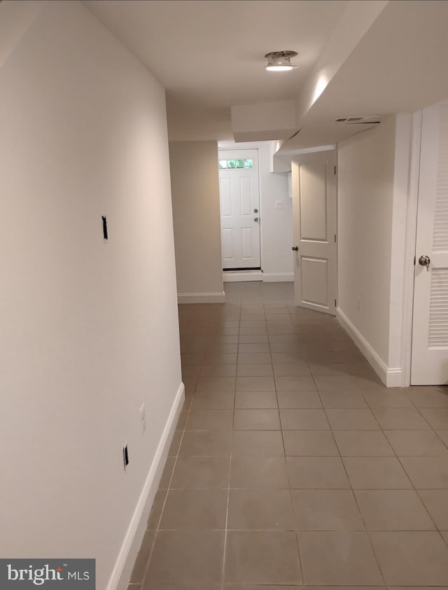 5709 Walther Ave, Baltimore, MD 21206 - hall featuring tile patterned floors and baseboards