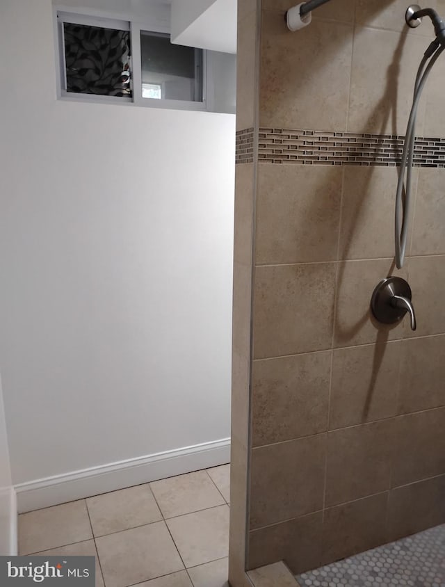 5709 Walther Ave, Baltimore, MD 21206 - full bath featuring tiled shower and tile patterned floors