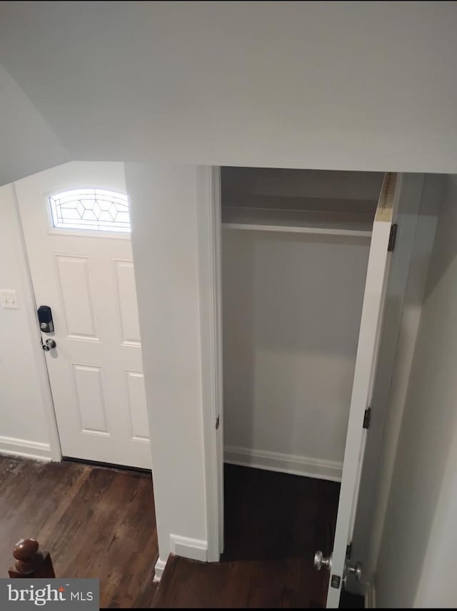 5709 Walther Ave, Baltimore, MD 21206 - foyer featuring dark wood-type flooring and baseboards