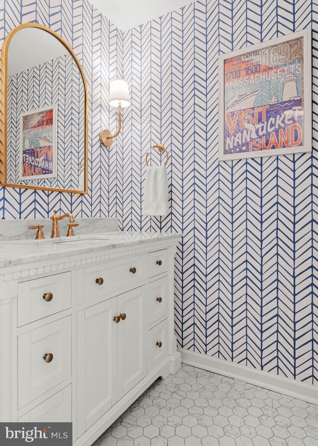 725 Cornerstone Ln, Bryn Mawr, PA 19010 - bathroom featuring wallpapered walls, baseboards, and vanity