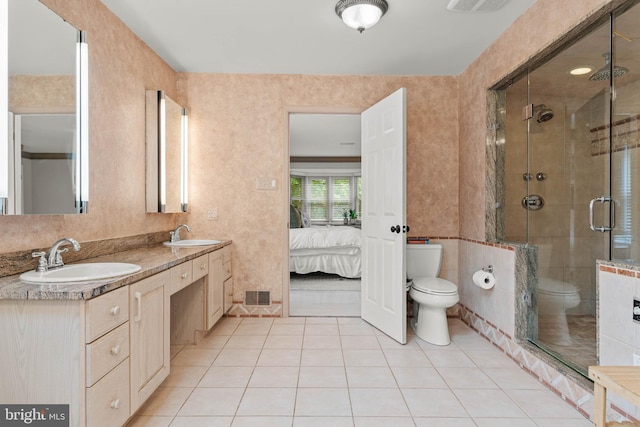 725 Cornerstone Ln, Bryn Mawr, PA 19010 - ensuite bathroom featuring toilet, double vanity, tile patterned flooring, and a shower stall