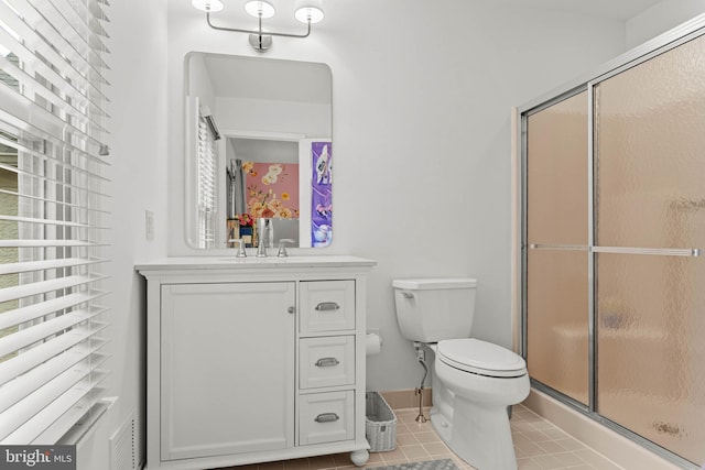 725 Cornerstone Ln, Bryn Mawr, PA 19010 - bathroom with vanity, a stall shower, toilet, and tile patterned floors