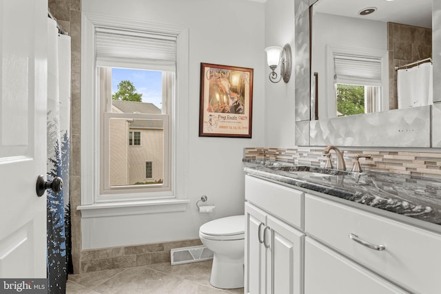725 Cornerstone Ln, Bryn Mawr, PA 19010 - full bath featuring vanity, toilet, decorative backsplash, tile patterned floors, and a shower with shower curtain