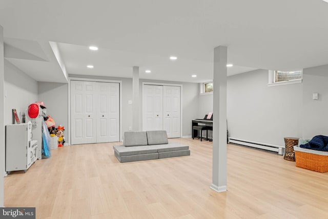725 Cornerstone Ln, Bryn Mawr, PA 19010 - basement featuring a baseboard radiator, light wood finished floors, and recessed lighting