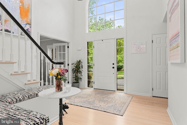 725 Cornerstone Ln, Bryn Mawr, PA 19010 - foyer with a high ceiling, wood finished floors, stairs, and baseboards