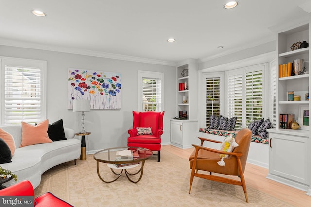 725 Cornerstone Ln, Bryn Mawr, PA 19010 - living area with built in shelves, recessed lighting, crown molding, light wood-style flooring, and healthy amount of natural light