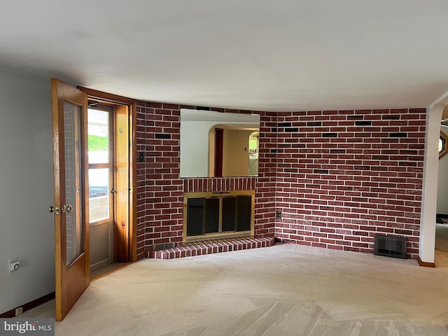 3600 Oak Ave, Altoona, PA 16601 - unfurnished living room featuring carpet flooring and a fireplace