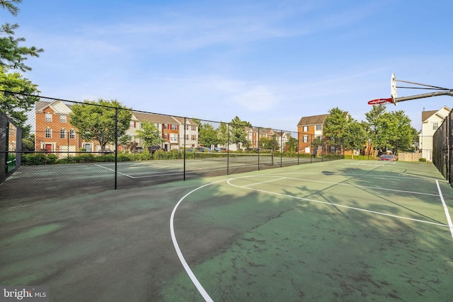 13503 Bannacker Pl, Herndon, VA 20171 - view of sport court featuring community basketball court, a residential view, and a tennis court