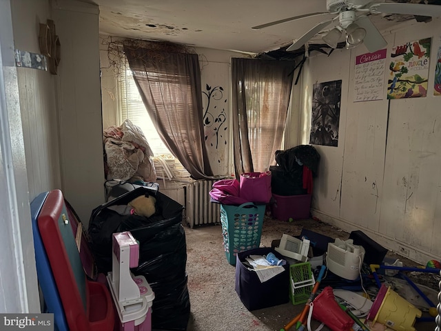 2857 Woodbrook Ave, Baltimore, MD 21217 - living area featuring radiator and a ceiling fan