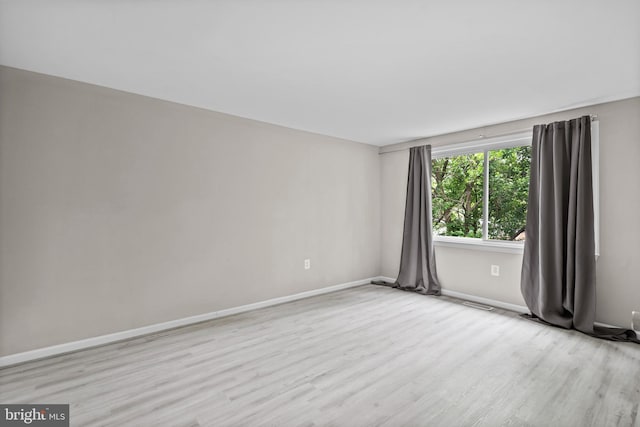 5908 Michael Rd, Waldorf, MD 20601 - empty room with wood finished floors and baseboards