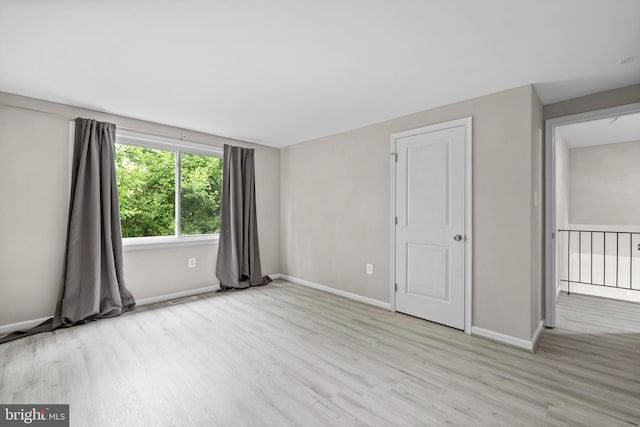 5908 Michael Rd, Waldorf, MD 20601 - spare room featuring light wood finished floors and baseboards