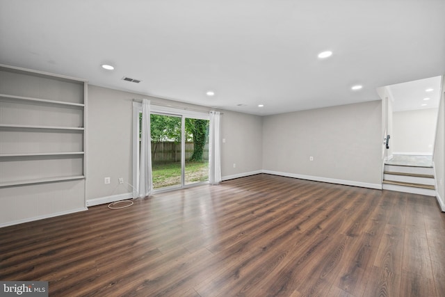 5908 Michael Rd, Waldorf, MD 20601 - unfurnished living room with wood finished floors, baseboards, recessed lighting, and built in shelves