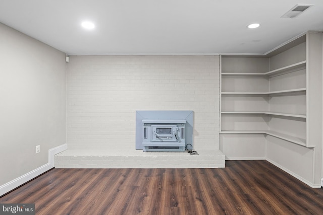 5908 Michael Rd, Waldorf, MD 20601 - unfurnished living room featuring wood finished floors, baseboards, a wood stove, and recessed lighting