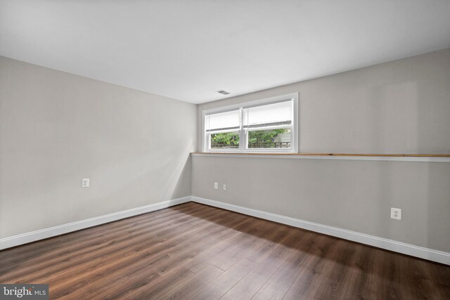 5908 Michael Rd, Waldorf, MD 20601 - empty room with wood finished floors and baseboards