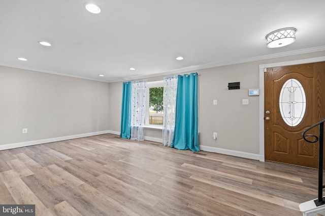 5908 Michael Rd, Waldorf, MD 20601 - entrance foyer featuring crown molding, baseboards, recessed lighting, and wood finished floors