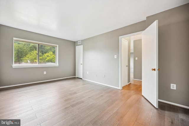 12205 Braxfield Ct Unit 45, Rockville, MD 20852 - spare room featuring light wood finished floors and baseboards