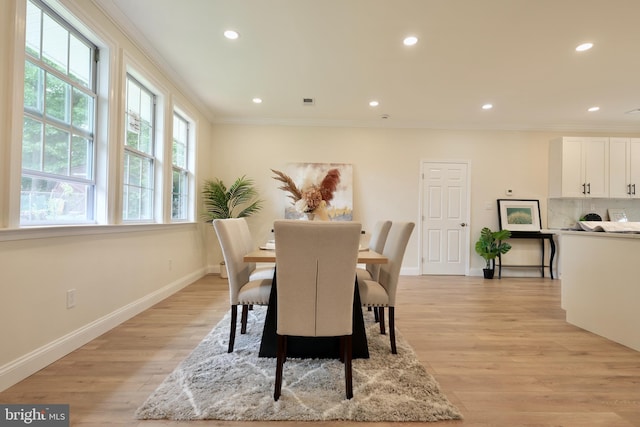 5503 Blacksburg Rd, Springfield, VA 22151 - dining space featuring recessed lighting, light wood finished floors, baseboards, and ornamental molding