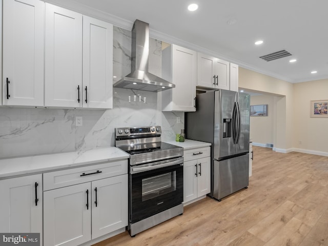 5503 Blacksburg Rd, Springfield, VA 22151 - kitchen with wall chimney range hood, stainless steel appliances, ornamental molding, tasteful backsplash, and white cabinetry