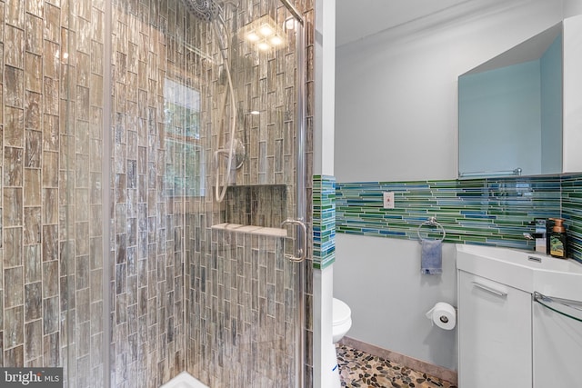 1918 Michael Rd, Waldorf, MD 20601 - bathroom featuring toilet, a shower stall, tile walls, and vanity