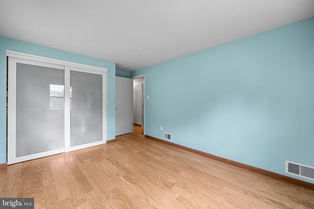 1918 Michael Rd, Waldorf, MD 20601 - unfurnished bedroom featuring wood finished floors, baseboards, and a closet