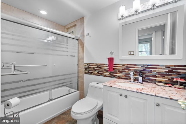1918 Michael Rd, Waldorf, MD 20601 - full bath featuring vanity, bath / shower combo with glass door, toilet, and tasteful backsplash