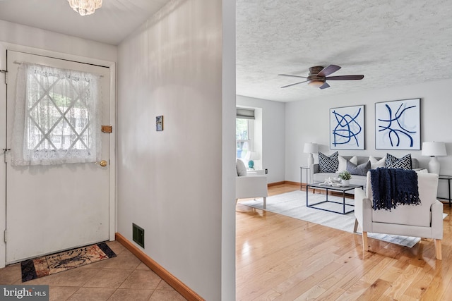 1918 Michael Rd, Waldorf, MD 20601 - entrance foyer with baseboards, ceiling fan, and wood finished floors