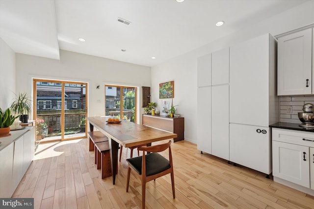 810 S 49th St, Philadelphia, PA 19143 - dining area featuring light wood-type flooring and recessed lighting