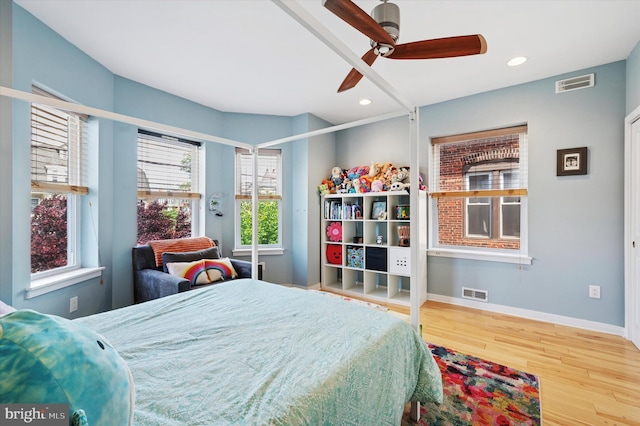810 S 49th St, Philadelphia, PA 19143 - bedroom with wood finished floors, baseboards, recessed lighting, and ceiling fan