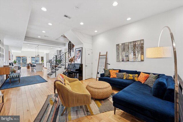 810 S 49th St, Philadelphia, PA 19143 - living room with stairway, recessed lighting, and light wood-style flooring