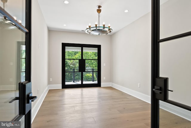 825 Whann Ave, Mclean, VA 22101 - entryway with a chandelier, wood finished floors, recessed lighting, and baseboards