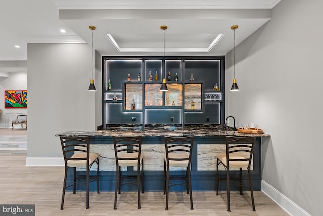 825 Whann Ave, Mclean, VA 22101 - indoor wet bar with a tray ceiling, baseboards, wood finished floors, recessed lighting, and crown molding