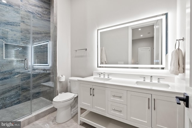 825 Whann Ave, Mclean, VA 22101 - bathroom featuring double vanity, toilet, and a shower stall