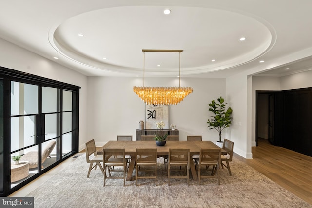 825 Whann Ave, Mclean, VA 22101 - dining room featuring a tray ceiling, recessed lighting, a chandelier, wood finished floors, and baseboards