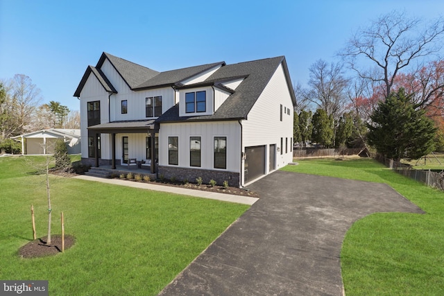 1749 Beulah Rd, Vienna, VA 22182 - modern farmhouse with driveway, covered porch, a garage, board and batten siding, and a shingled roof