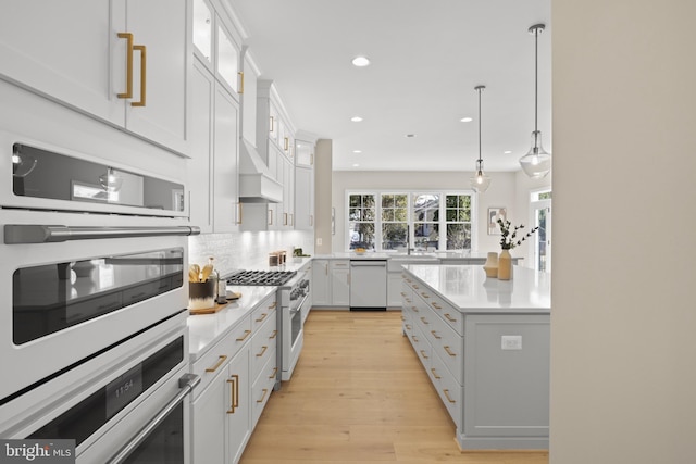1749 Beulah Rd, Vienna, VA 22182 - kitchen with white appliances, light wood finished floors, recessed lighting, light countertops, and white cabinetry