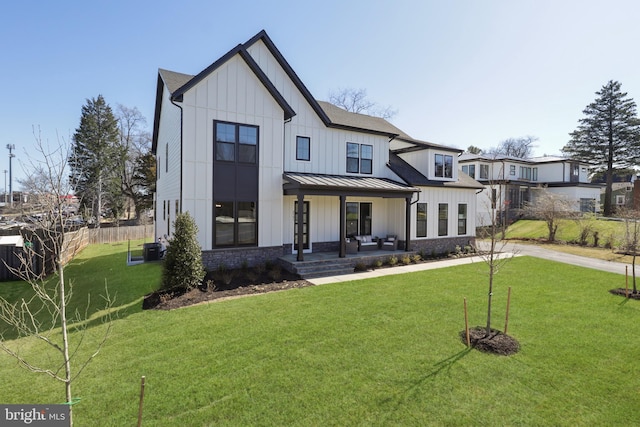 1749 Beulah Rd, Vienna, VA 22182 - modern farmhouse with a standing seam roof, board and batten siding, and metal roof