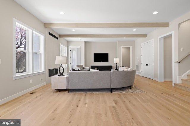 1749 Beulah Rd, Vienna, VA 22182 - living area featuring baseboards, beam ceiling, stairway, light wood finished floors, and recessed lighting