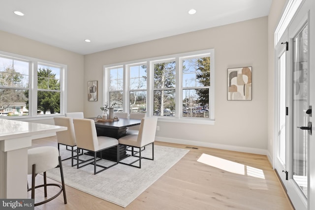 1749 Beulah Rd, Vienna, VA 22182 - dining room featuring healthy amount of natural light, light wood-type flooring, recessed lighting, and baseboards
