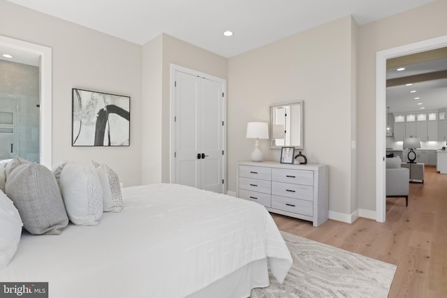 1749 Beulah Rd, Vienna, VA 22182 - bedroom featuring recessed lighting, light wood-type flooring, ensuite bath, baseboards, and a closet