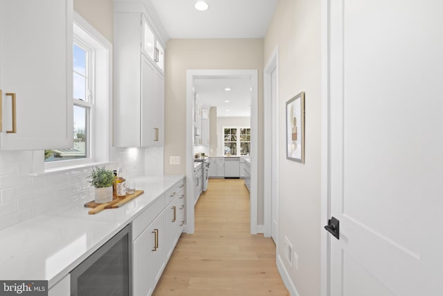 1749 Beulah Rd, Vienna, VA 22182 - hallway featuring beverage cooler, light wood-style flooring, and recessed lighting