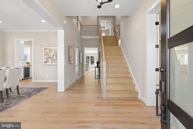 1749 Beulah Rd, Vienna, VA 22182 - entryway featuring stairway, ornamental molding, baseboards, light wood-type flooring, and recessed lighting