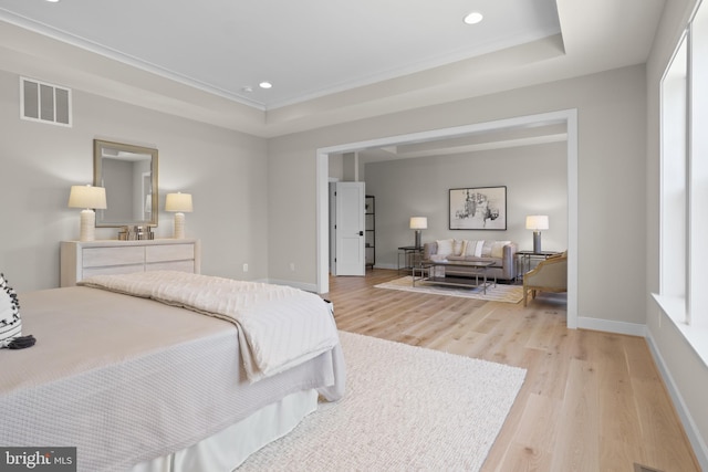 1749 Beulah Rd, Vienna, VA 22182 - bedroom featuring light wood finished floors, a tray ceiling, baseboards, and recessed lighting