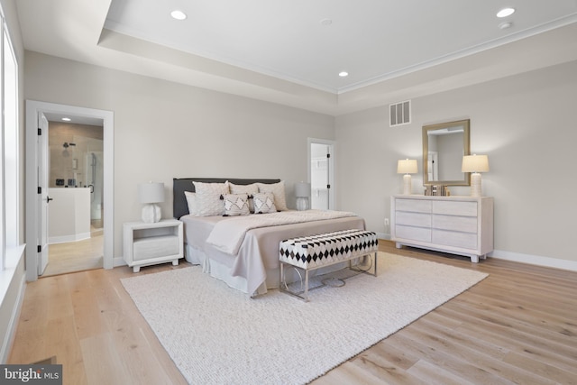 1749 Beulah Rd, Vienna, VA 22182 - bedroom featuring light wood-style floors, baseboards, recessed lighting, and a tray ceiling