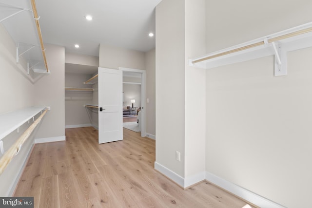 1749 Beulah Rd, Vienna, VA 22182 - spacious closet featuring light wood finished floors