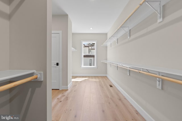 1749 Beulah Rd, Vienna, VA 22182 - walk in closet with wood finished floors