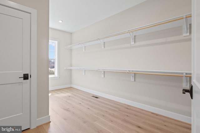1749 Beulah Rd, Vienna, VA 22182 - spacious closet featuring light wood-style floors