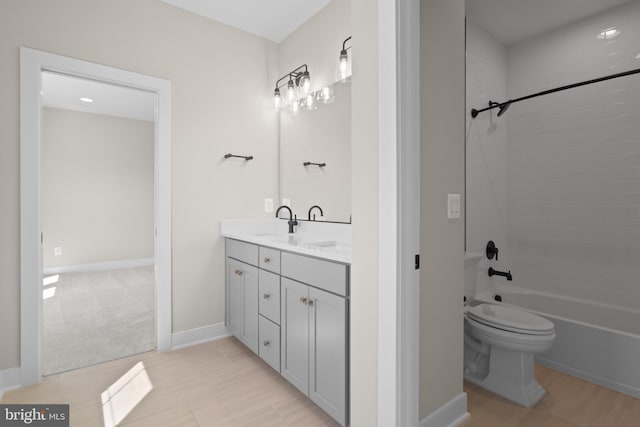 1749 Beulah Rd, Vienna, VA 22182 - full bath featuring vanity, shower / bathtub combination, toilet, and baseboards