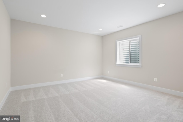 1749 Beulah Rd, Vienna, VA 22182 - empty room featuring light carpet, recessed lighting, and baseboards
